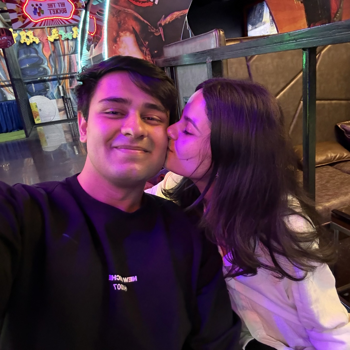 A kiss on the cheek at the arcade