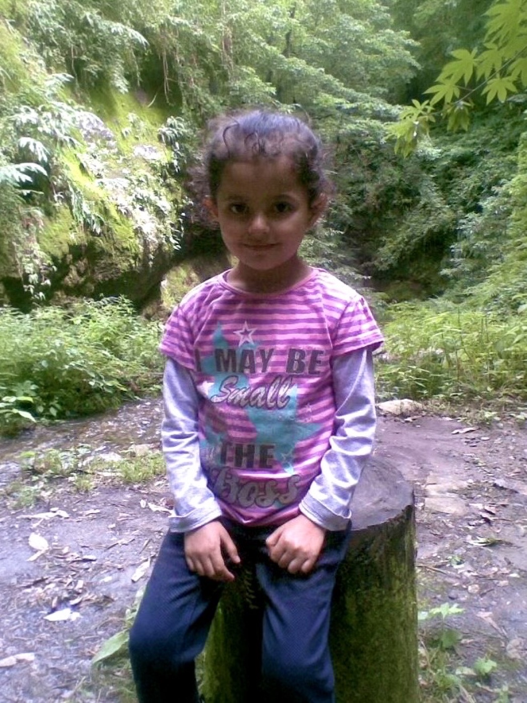 Ridhi as a little kid in the forest